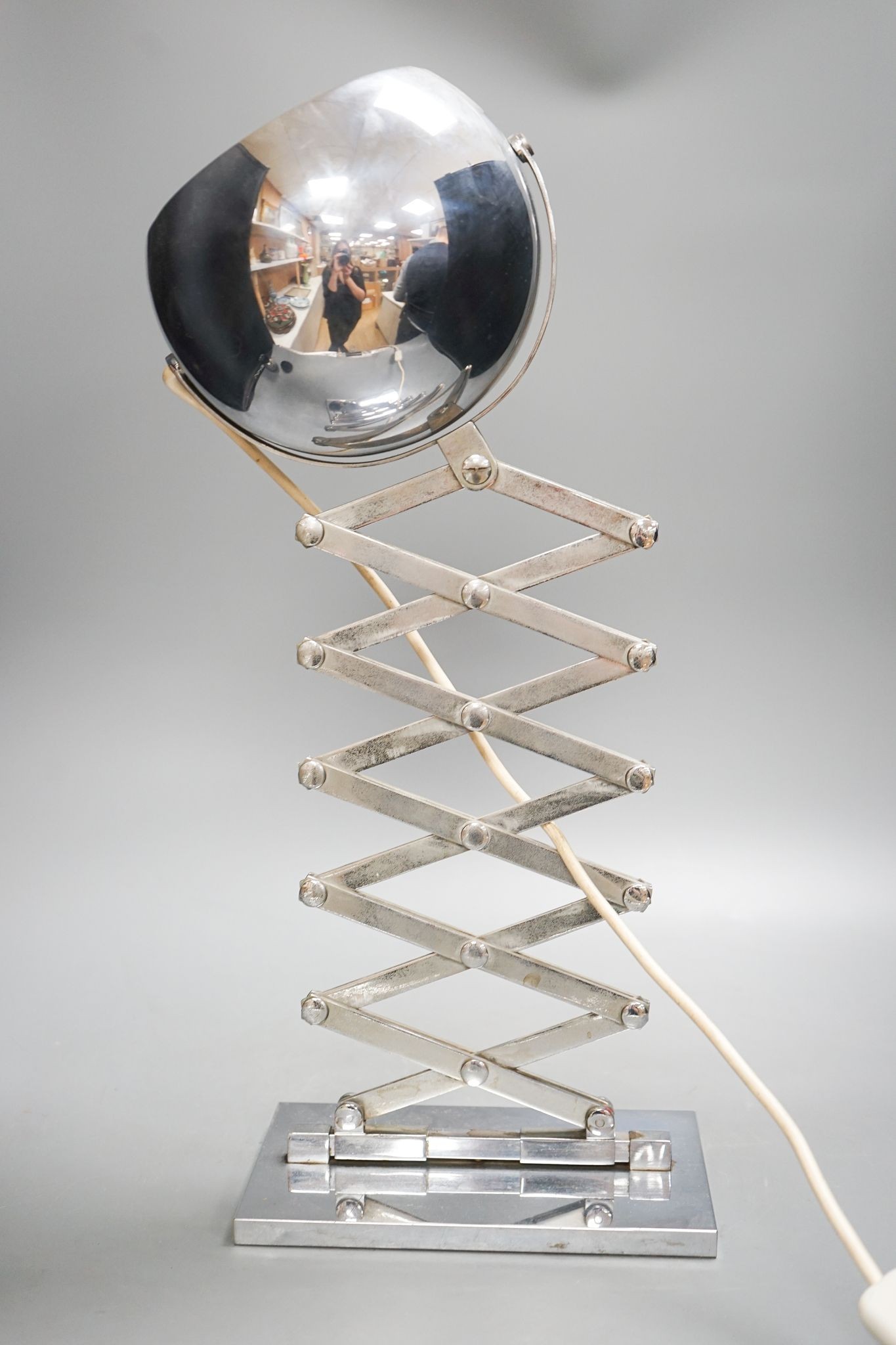 An Ingo Mauser chromed concertina desk lamp